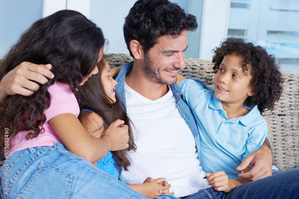 Happy, hugging and father with children on sofa for bonding, love and care at family home. Smile, fun and young dad embracing and having fun with kids on couch of living room at modern house together Happy, hugging and father with children on sofa for bonding, love and care at family home. Smile, fun and young dad embracing and having fun with kids on couch of living room at modern house together