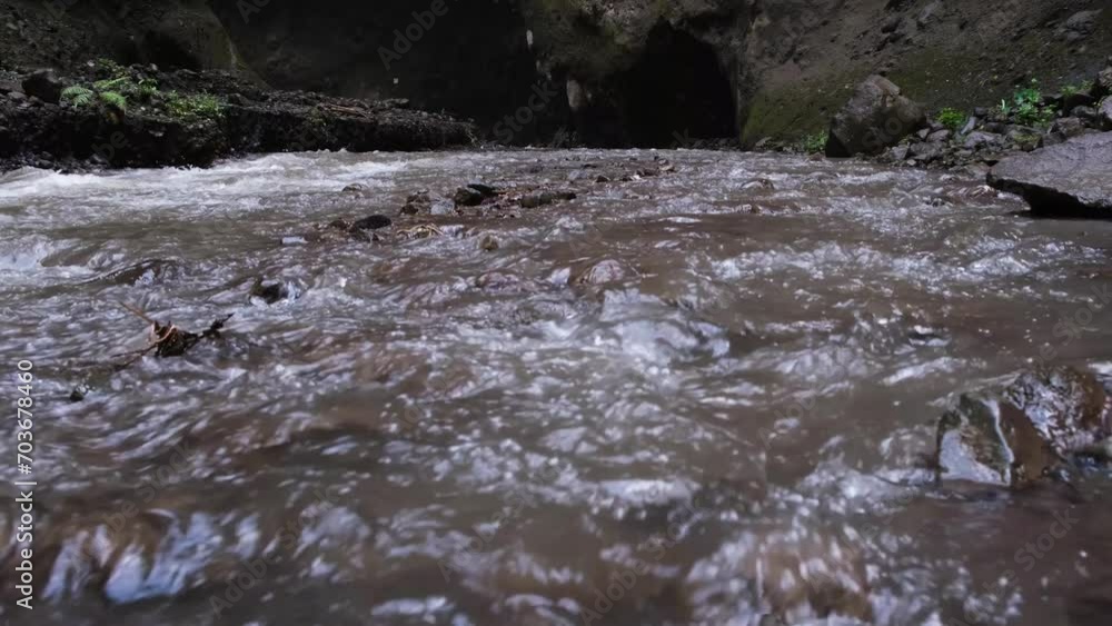 Water flows fast in a river slowmotion Water flows fast in a river slowmotion