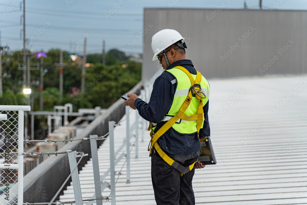 Concept of solar cell service and maintenance, engineering and maintenance man on site job for check and install solar panel on roof of factory. Concept of solar cell service and maintenance, engineering and maintenance man on site job for check and install solar panel on roof of factory.