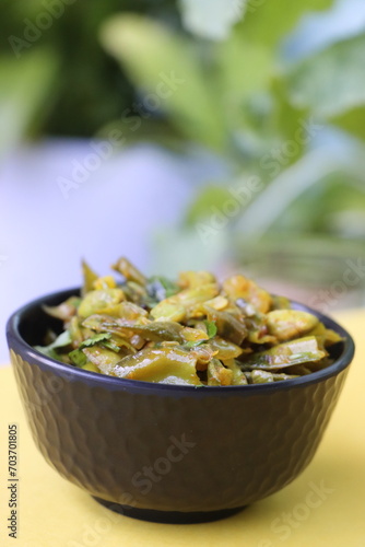 Masala flat green beans, onions, and curry spices, pan fried photo