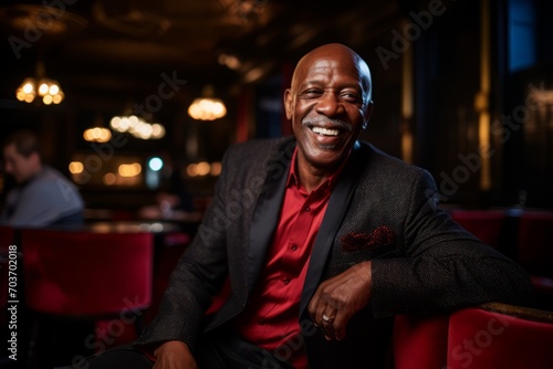 Portrait of a happy senior african american man in a restaurant.