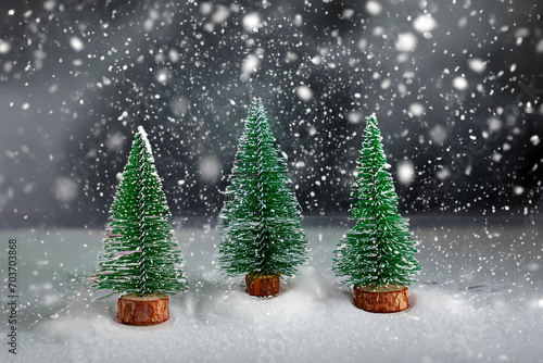 Christmas background with snowy trees and falling snow