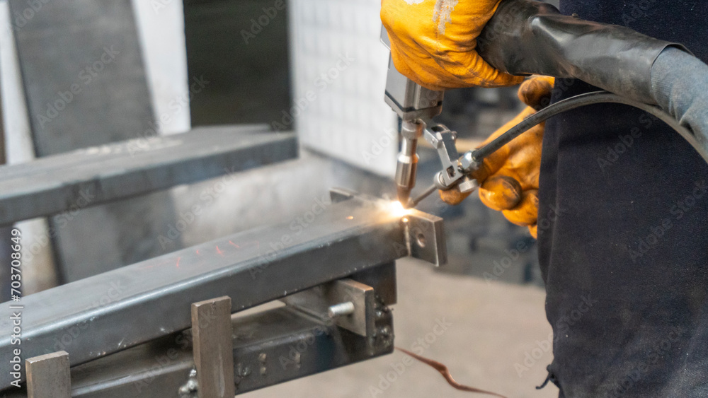 close up of a blacksmith working on a metal close up of a blacksmith working on a metal