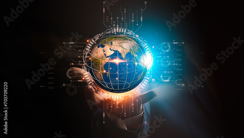 Fototapeta Naklejka Na Ścianę i Meble -  Businessman Holds Glowing Globe Amid Hi-Tech Icons, Depicting Growth and Data Analysis - A Futuristic Concept for Tomorrow's Success..Elements of this image furnished by NASA