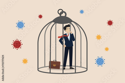 Coronavirus COVID-19 lockdown impact business, self quarantine in Coronavirus crisis concept, sad businessman depress standing in cage with virus pathogen