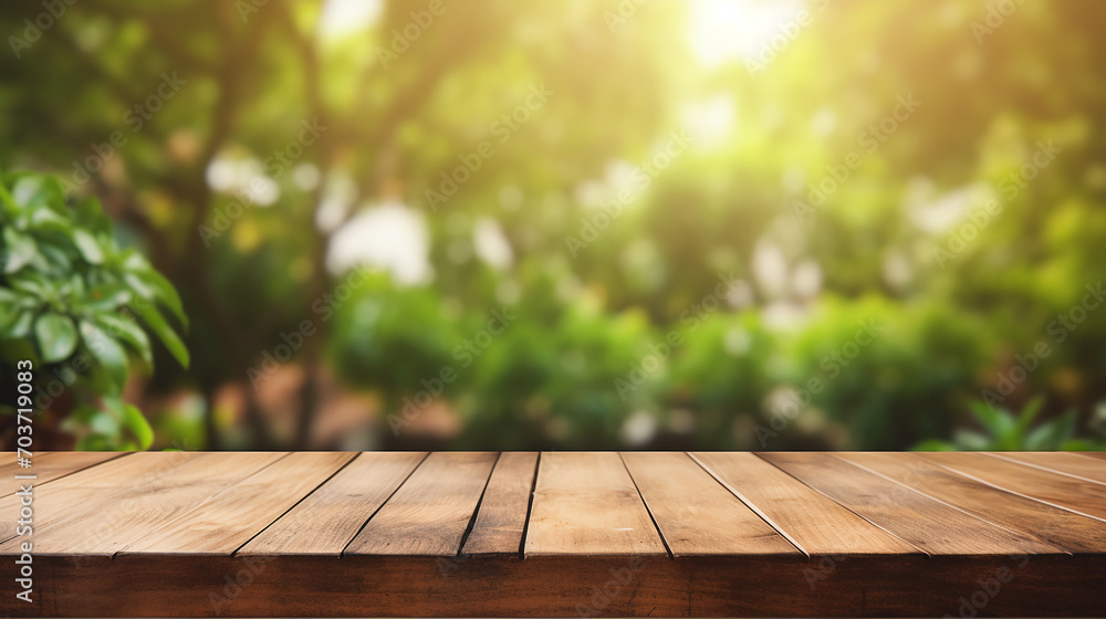 brown wood plank table top on blur and bokeh abstract background with sunlight