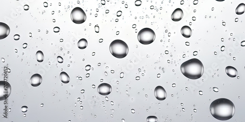 Rain drop on white background, a close up of water droplets on a white surface , Water Drops on a Window, depicts rain droplets on glass..for nature, weather, and environmental designs.