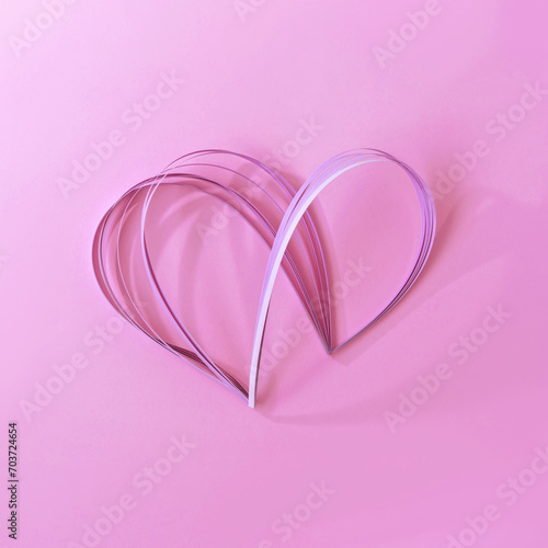 Festive holiday greeting card for Valentine day, February, 14 celebration, styled paper craft heart on bright pink background with soft light shadows, minimal aesthetic love concept