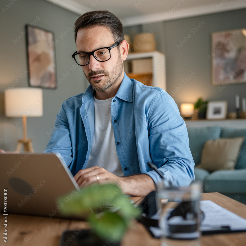 one man adult caucasian work on laptop at home happy smile one man adult caucasian work on laptop at home happy smile
