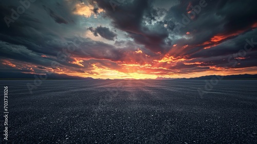 An awe-inspiring scene of a dark  dramatic sky meeting the horizon during an epic sunset