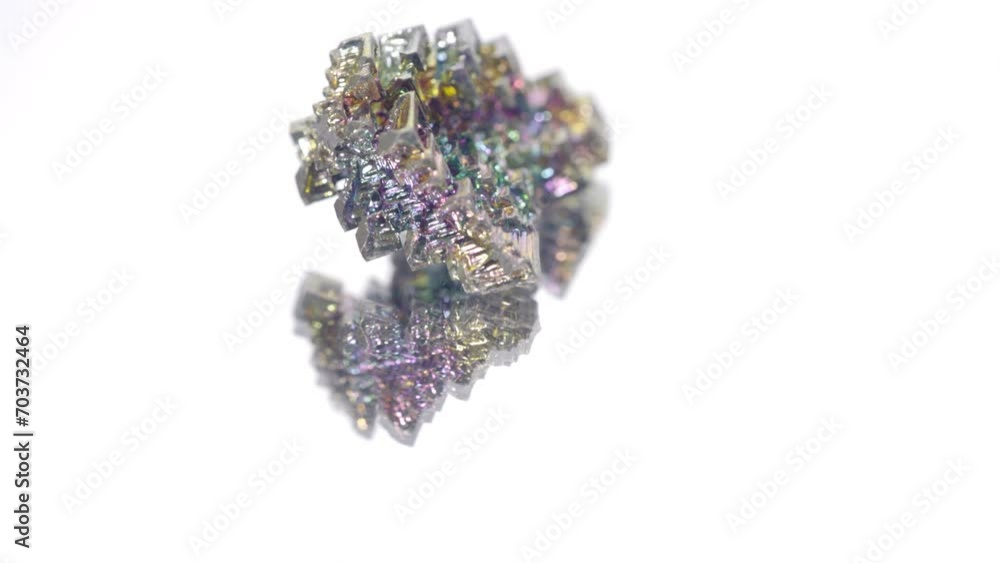 video with small bismuth crystals. multicolor metal rotation isolated on white background video with small bismuth crystals. multicolor metal rotation isolated on white background