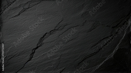 Dark grey black slate texture background. Black stone texture. Black granite slabs background photo