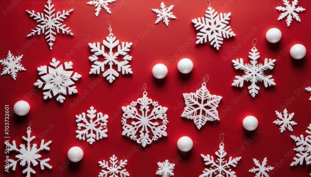 a group of snowflakes on a red background with white balls and snowflakes hanging from the top of the snowflakes and on the bottom of the snowflakes. a group of snowflakes on a red background with white balls and snowflakes hanging from the top of the snowflakes and on the bottom of the snowflakes.