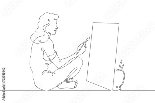 A woman artist paints. A girl paints a picture with a brush on canvas. One continuous line drawing. Linear. Hand drawn, white background. One line