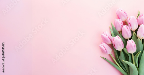 Delicate Pink Tulips on Soft Pastel Background - A fresh bouquet of spring tulips gracefully arranged at the corner, symbolizing gentle elegance © Mirador