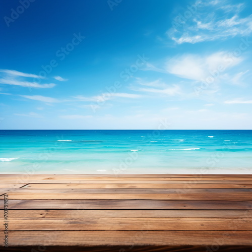 A wooden dock overlooking a tropical beach with crystal clear water 
