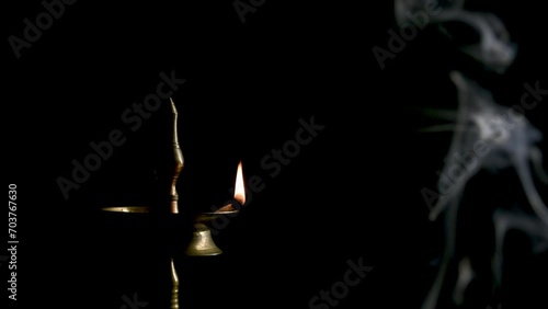 Indian oil lamp isolated in Black Background, 4k Video photo