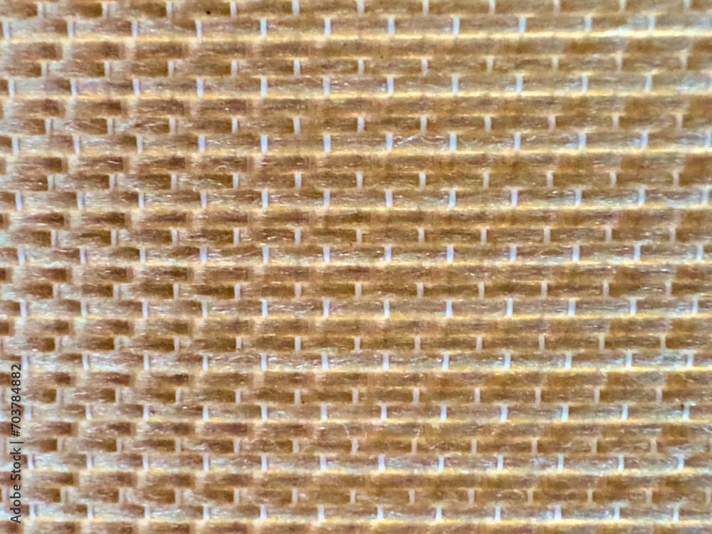 Beige woven woven texture close up. Beige woven woven texture close up.