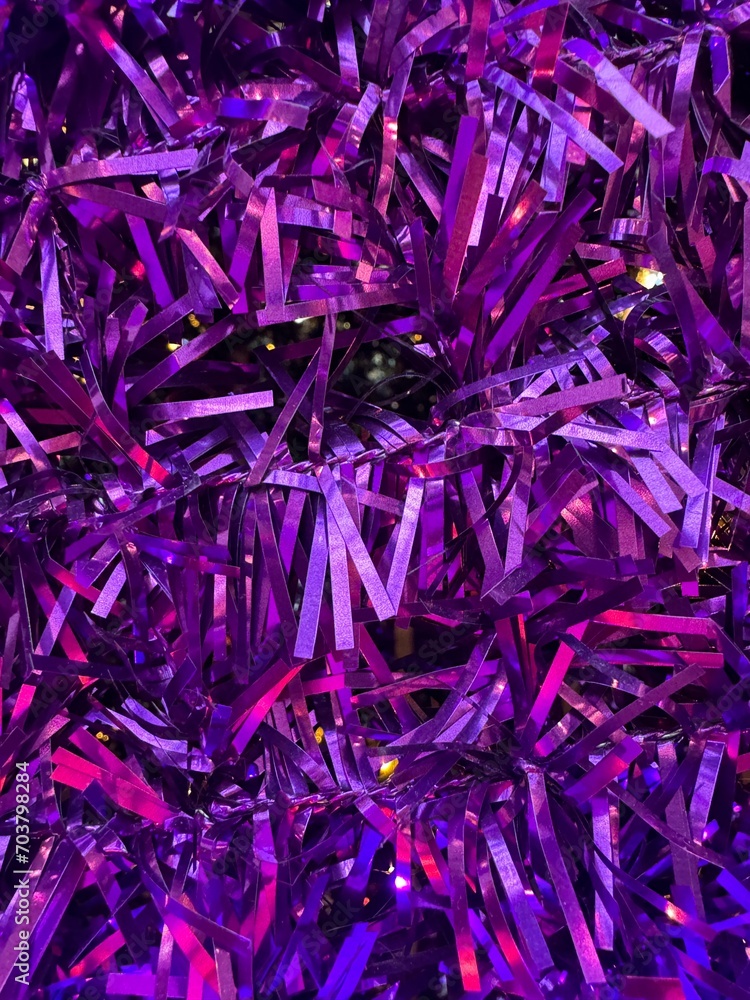 christmas decorations of shimmering purple tinsel christmas decorations of shimmering purple tinsel