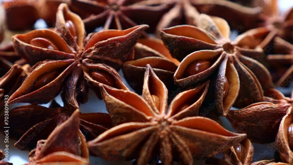 Dried brown star anise spices circle rotation close up Dried brown star anise spices circle rotation close up