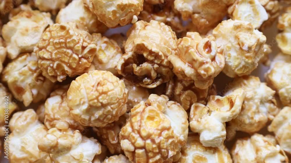 Sweet caramel glazed popcorn circle rotation close up top view Sweet caramel glazed popcorn circle rotation close up top view