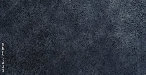 dark blue suede texture background.