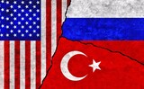 USA, Russia and Turkey painted flags on a wall with a crack. United States of America, Turkey and Russia relations