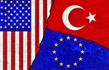 USA, European Union and Turkey painted flags on a wall with a crack. United States of America, Turkey and EU relations