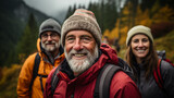 Group of senior various national people hiking through the forest and mountains together