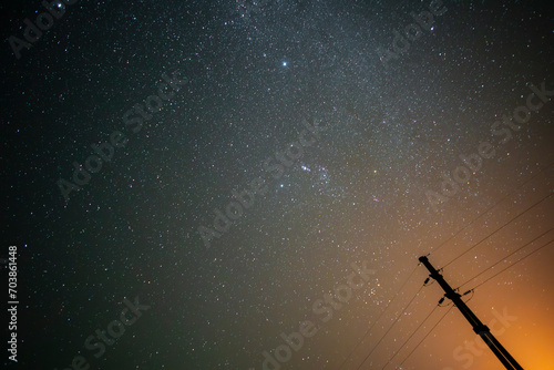 High voltage power line in a nocturnal landscape, La Pampa, Patagonia, Argentina.