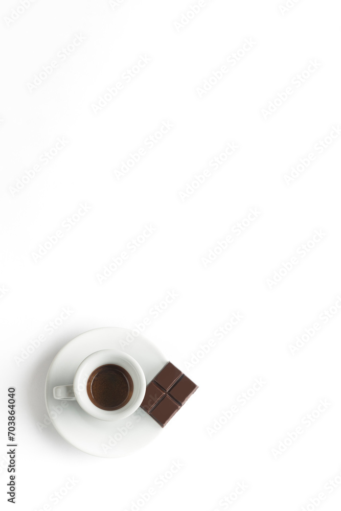 Cup of coffee with chocolate on white background. Cup of espresso.Top view Cup of coffee with chocolate on white background. Cup of espresso.Top view