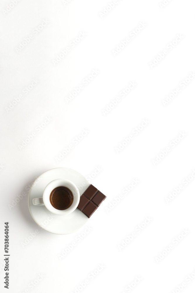 Cup of coffee with chocolate on white background. Cup of espresso.Top view Cup of coffee with chocolate on white background. Cup of espresso.Top view