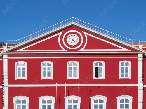 Santa Apolonia station in Lisbon with a shining red facade