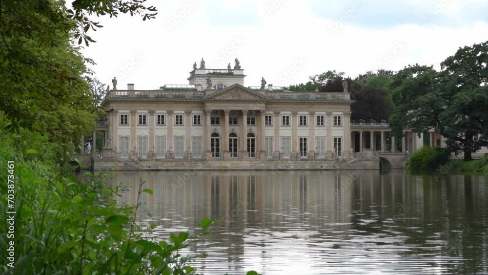 Lake house. Lazienki Park with pond. The palace on the water is a monument of architecture. Lake house. Lazienki Park with pond. The palace on the water is a monument of architecture.