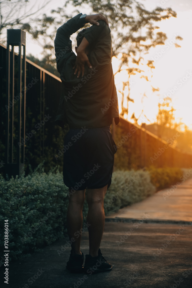 Athlete runner feet running on road, Jogging concept at outdoors. Man running for exercise..Athlete runner feet running on road, Jogging concept at outdoors. Man running for exercise.