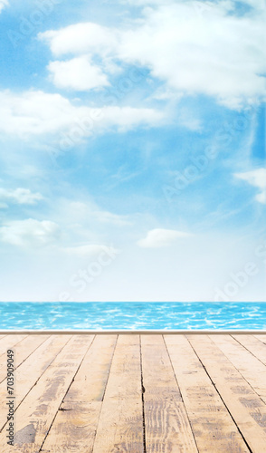 Wooden pier, exotic sea and a blue sky. Beautiful summer background. Vacation and traveling concept. © Acronym
