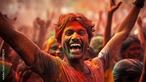 People celebrating the Holi festival of colors in Nepal or India photo