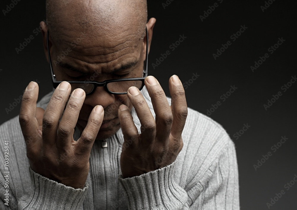 man praying to god Caribbean man praying with black grey background with people stock photo man praying to god Caribbean man praying with black grey background with people stock photo