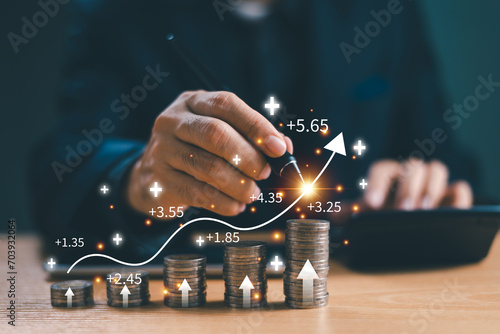 Bank interest rate, finance dividend concept. Businessman calculating saving trade, yield return on money investment, data stock, tax graph return, retirement compensation fund, business market .