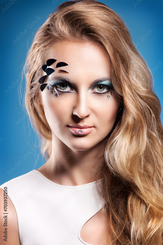Portrait of beautiful blond girl with make up