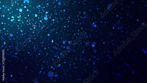 Motion background with animated shiny blue particles.