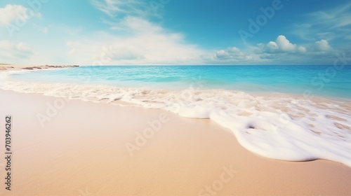 Tranquil Seaside Beauty: Blue Sky, White Shore, and Ocean Waves in Summertime Paradise © Sunanta