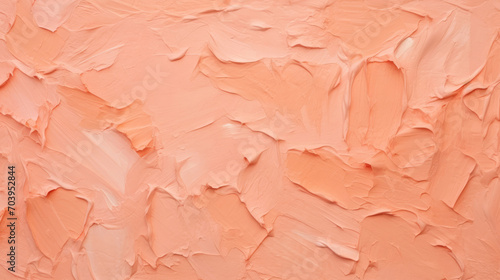 Abstract peach fuzz thick impasto background. Brush strokes, smears of pastel pink orange paint. The color of the year 2024