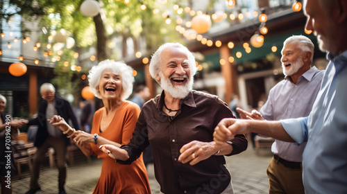 A joyous group of elderly people showing vitality while dancing  highlights companionship and active lifestyle in retirement