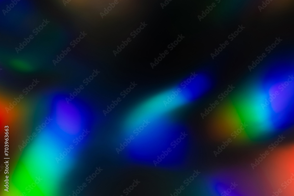 Blur colorful rainbow crystal light leaks on black background. Defocused abstract multicolored retro film lens flare bokeh analog photo overlay or screen filter effect. Glow Vintage prism colors