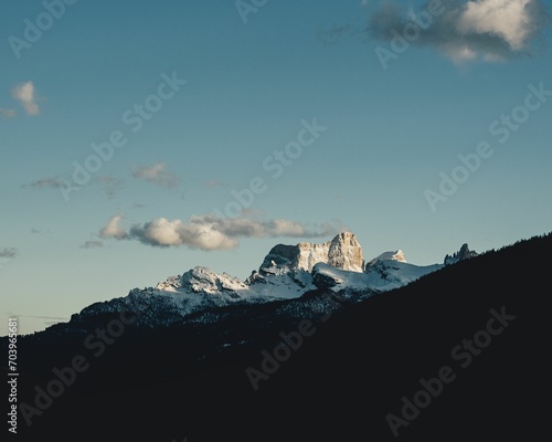 two peaks are standing on a cliff, and there is no snow © Wirestock