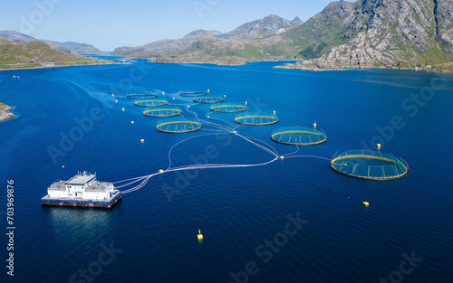 Salmon farm aquaculture in a fjord in Norway, Scandinavia photo