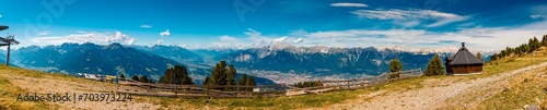 High resolution stitched alpine summer panorama with the city of Innsbruck in the background at Mount Patscherkofel, Tyrol, Austria