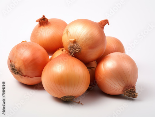 pile of onions, their pungent taste and unique aroma isolated on white background