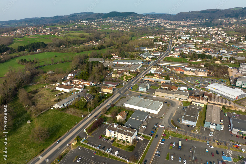 Aerial view of goods warehouses and logistics center in industrial city zone from above